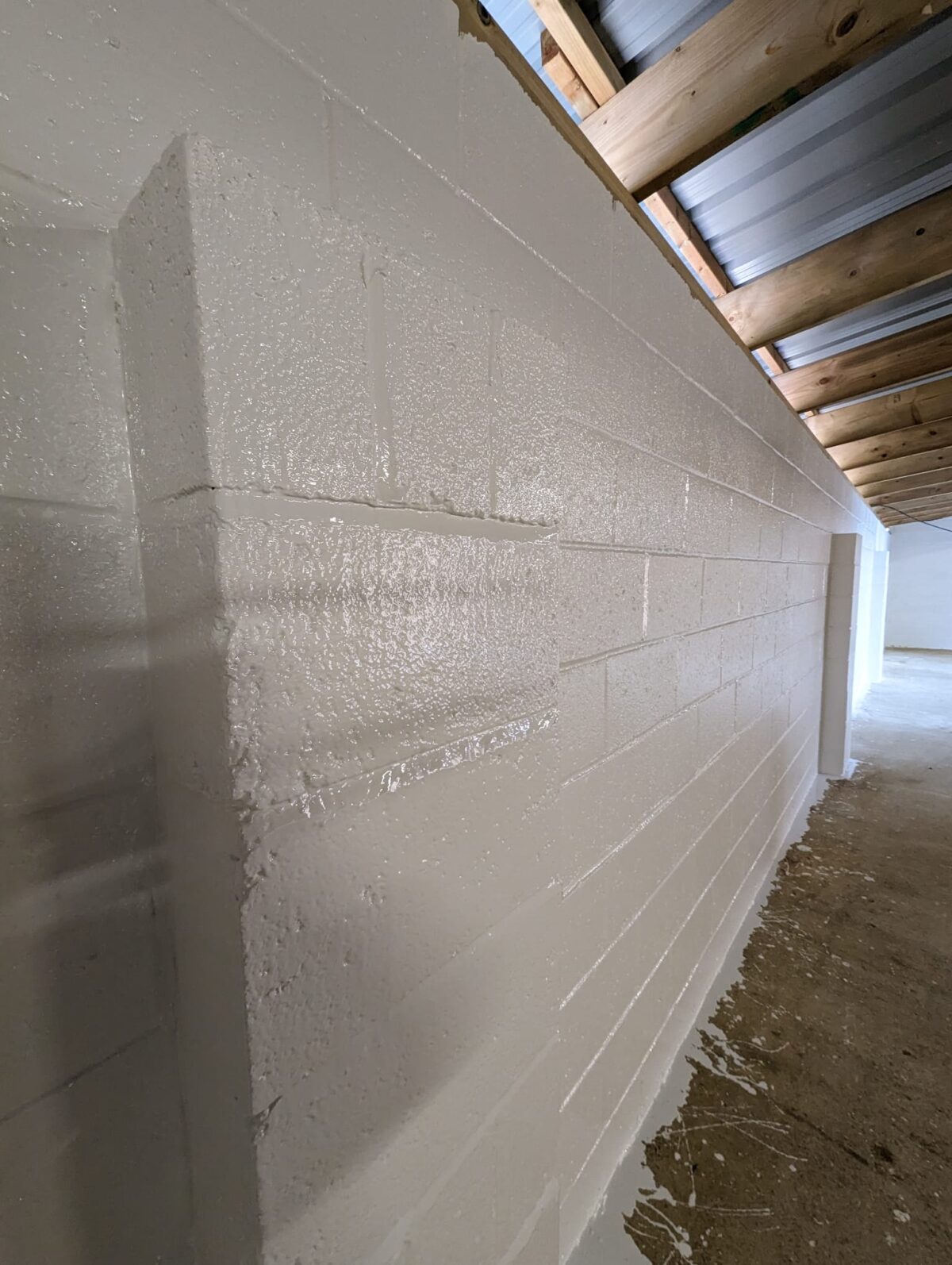 Breeze block wall completely sealed with White Hyglaze EP